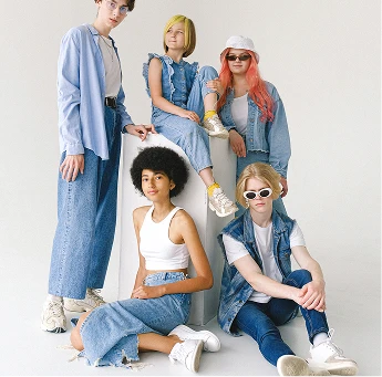 Group of friends in denim outfits